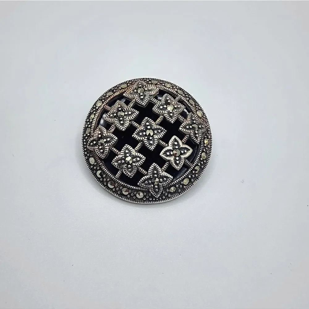 Vintage sterling silver black onyx marcasite brooch